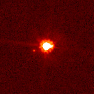 Eris and its moon Dysnomia (credit:- NASA/ESA/M. Brown)